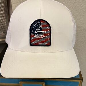 Travis Mathew White Hat with Red and Blue Patch